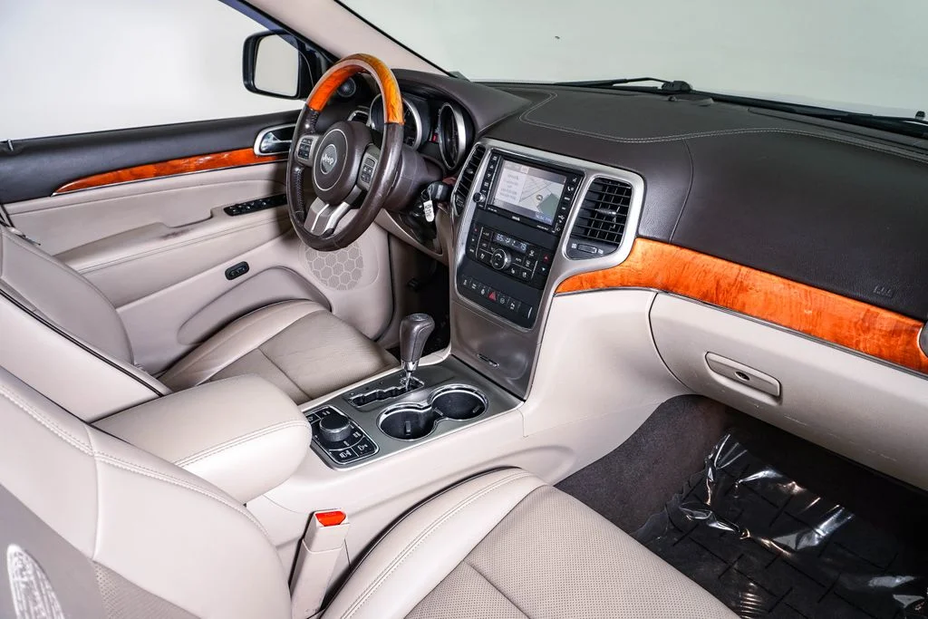 Used 2011 Bright Silver Metallic Jeep Overland image 14