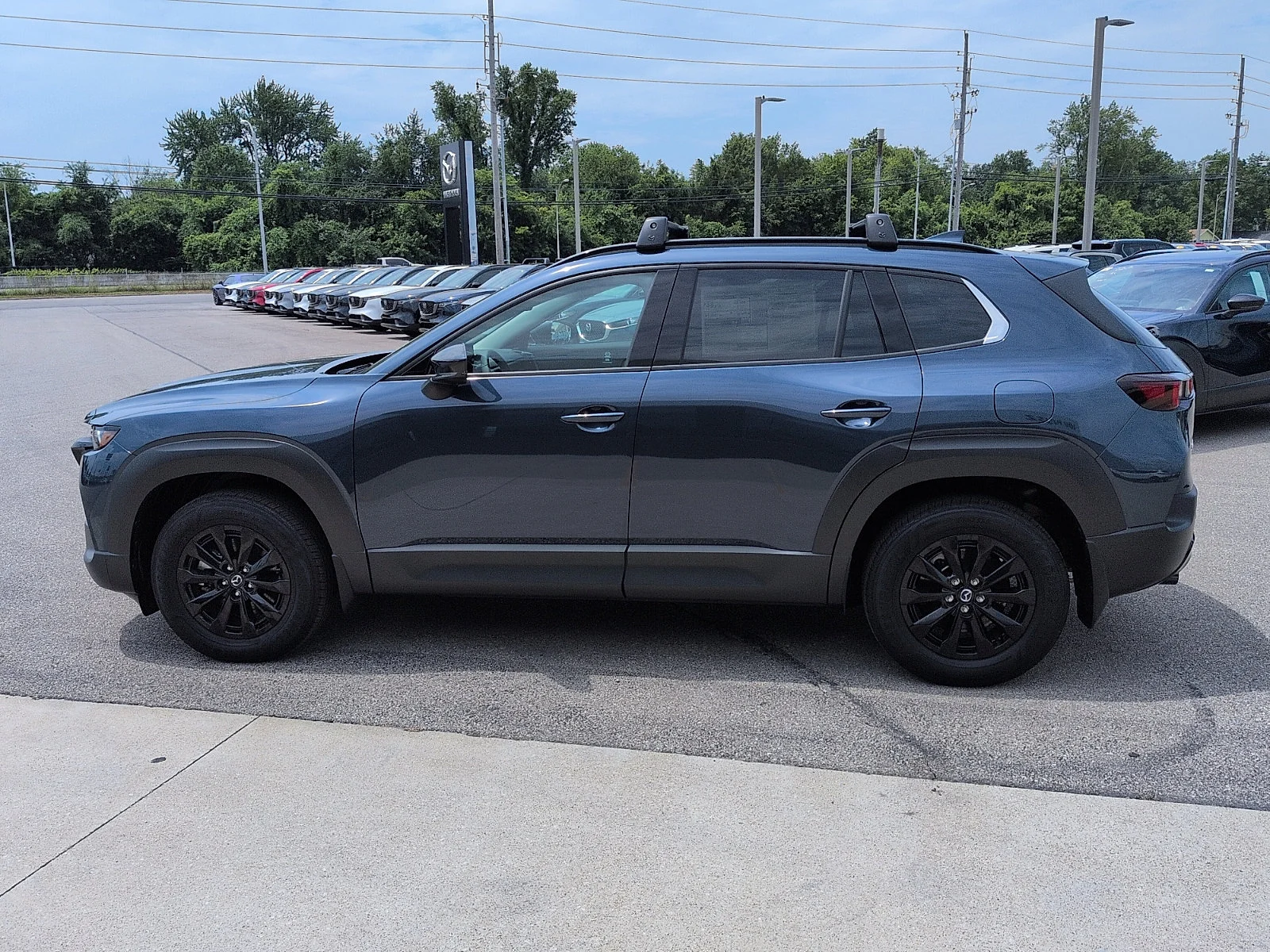 New 2026 Ingot Blue Metallic Mazda Premium image 4