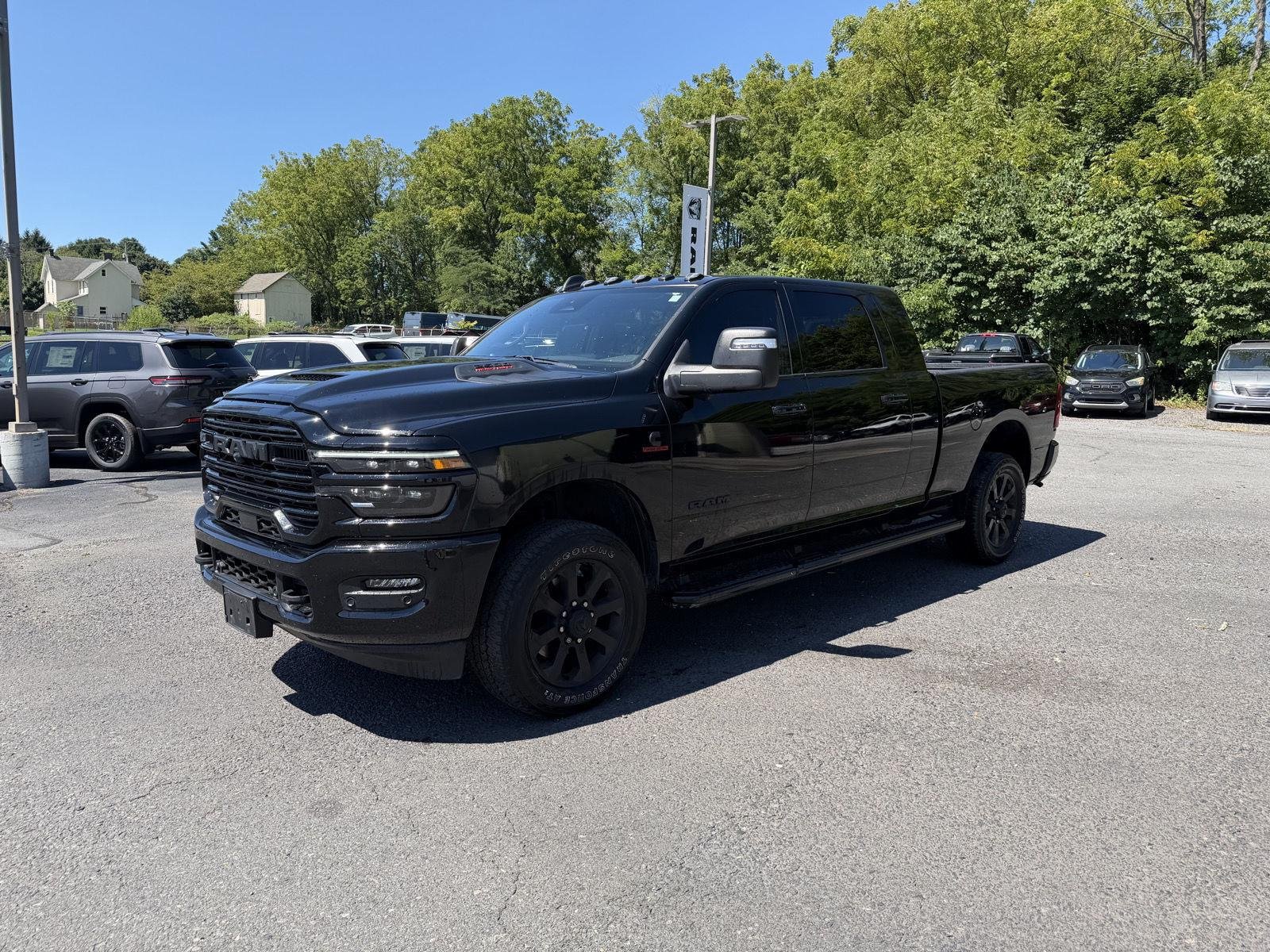Used 2025 Diamond Black Crystal Pearlcoat Ram Laramie image 7