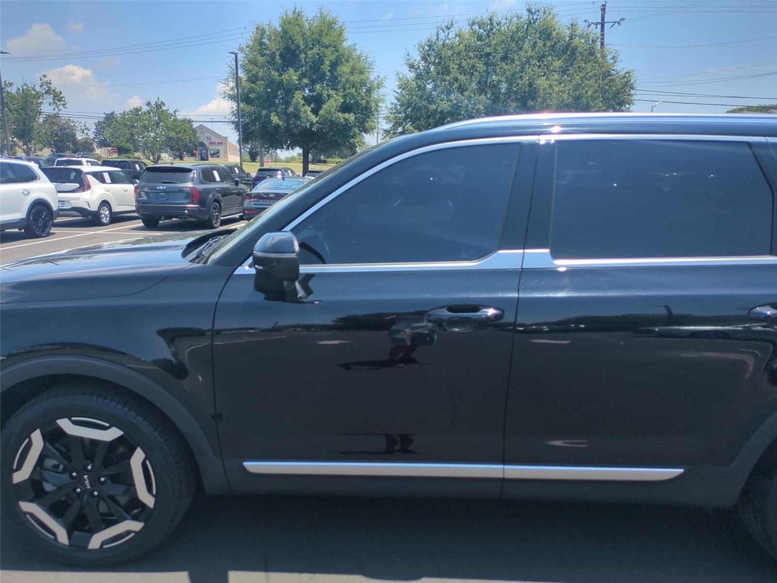 Used 2024 Ebony Black Kia EX image 30