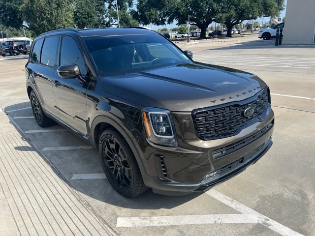 Used 2021 Dark Moss Kia SX image 1