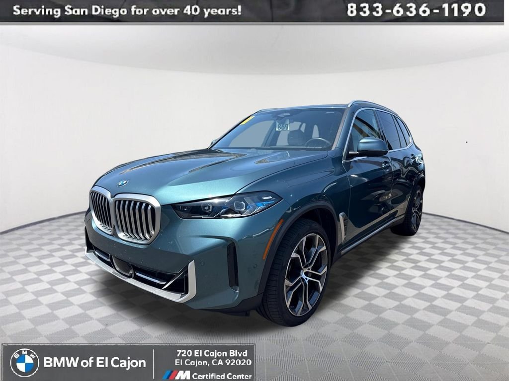 Used 2024 Blue BMW sDrive40i image 1