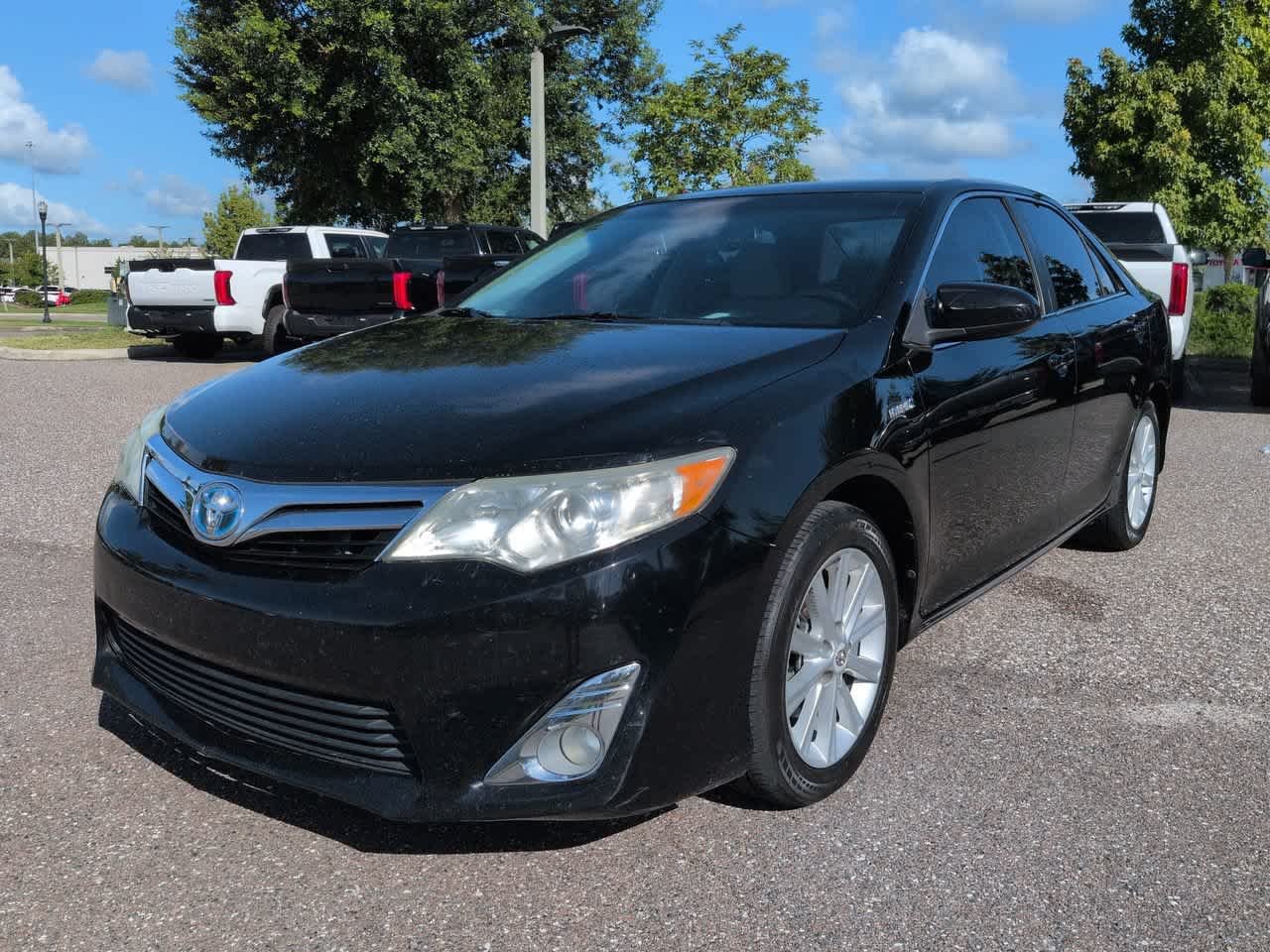 Used 2013 Toyota Camry XLE Hybrid with VIN 4T1BD1FK3DU094655 for sale in Wesley Chapel, FL