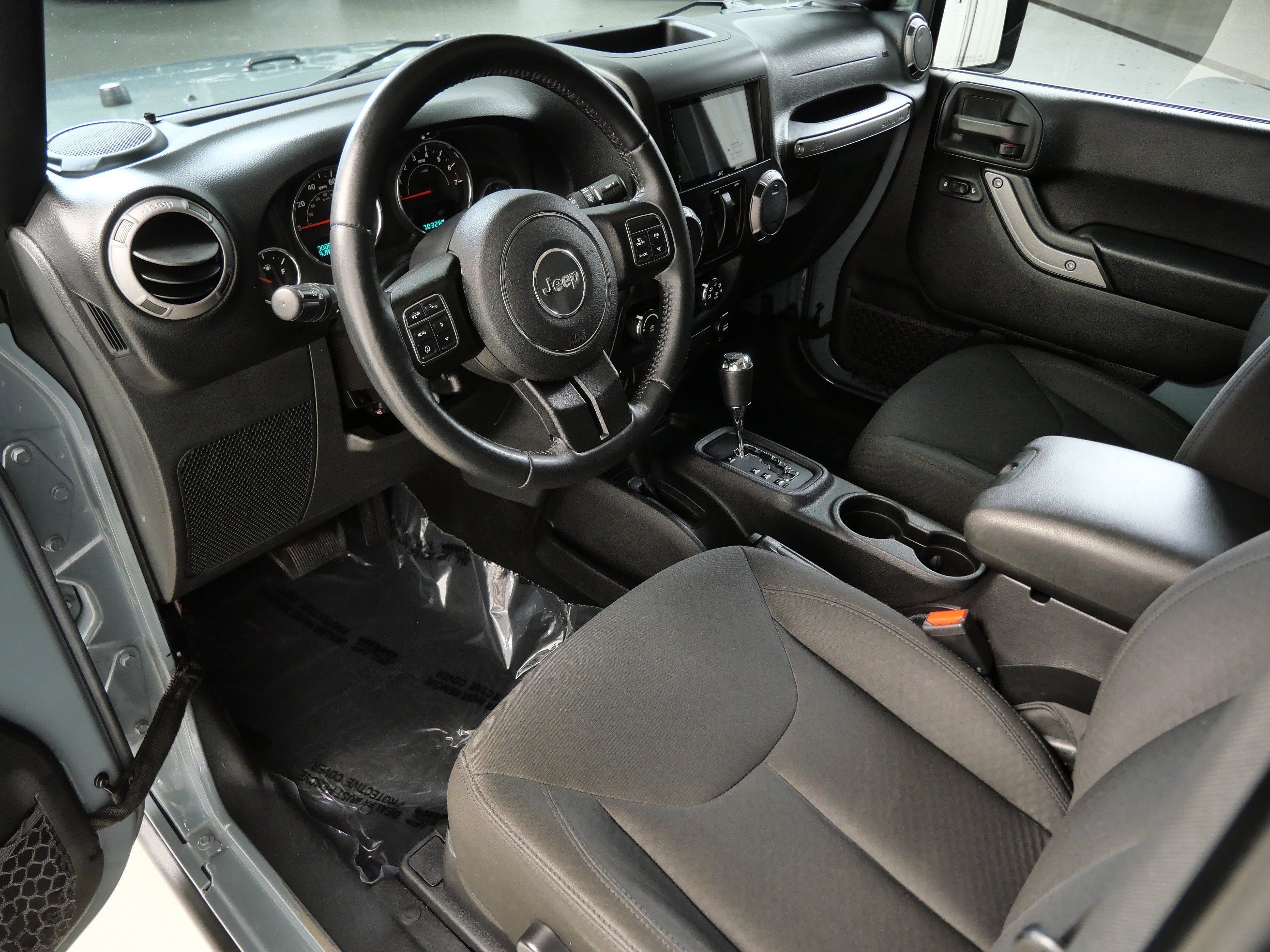 Used 2015 Jeep Wrangler Willys Wheeler with VIN 1C4AJWAG7FL734898 for sale in Minnetonka, Minnesota