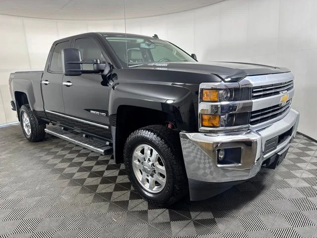Used 2015 Black Chevrolet LTZ image 1