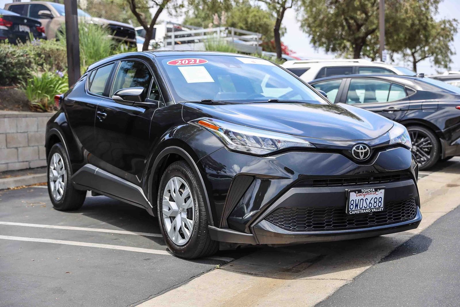Certified Used 2021 BLACK SAND PEARL Toyota LE image 3