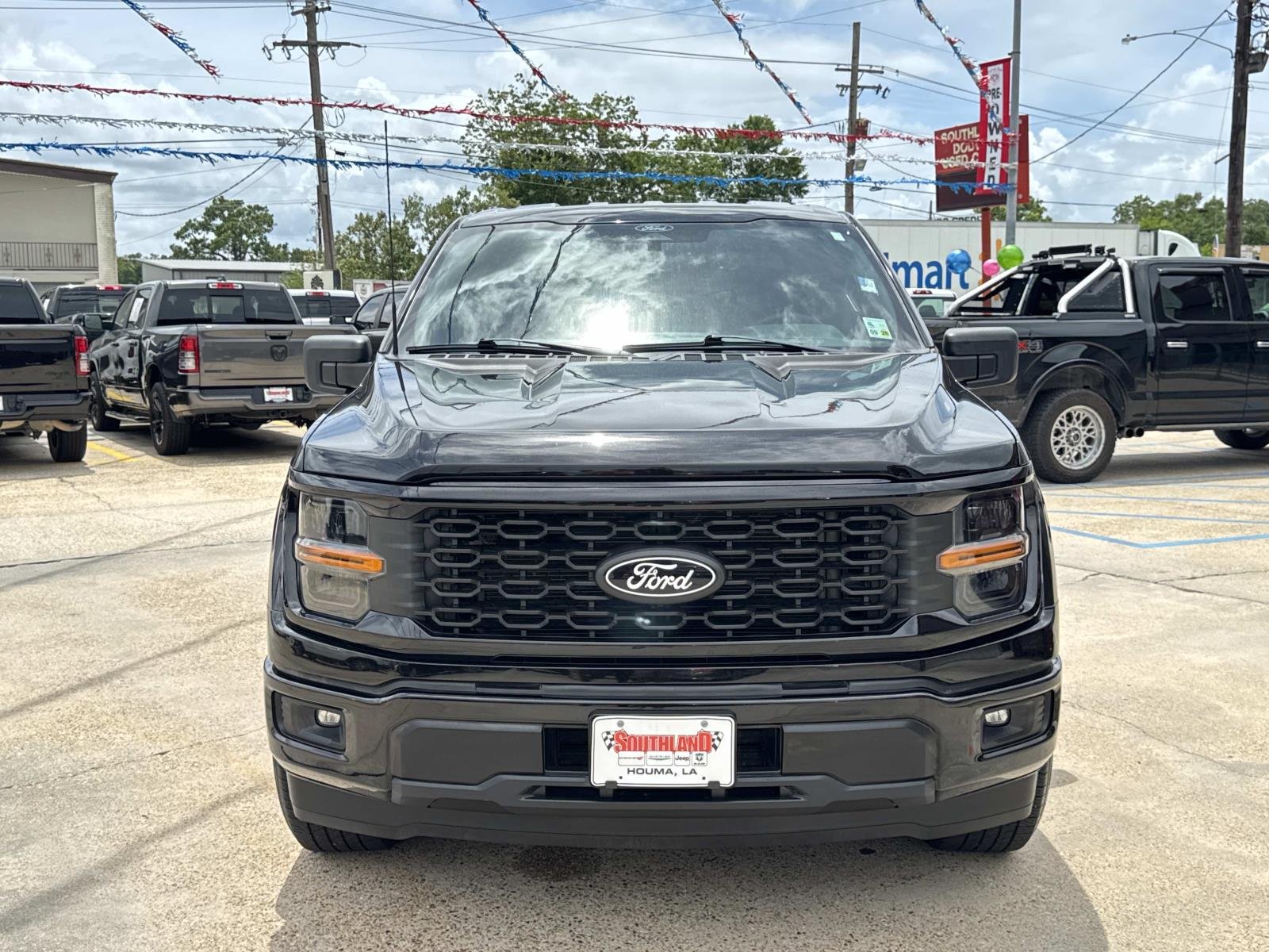 Used 2024 Agate Black Metallic Ford STX image 2