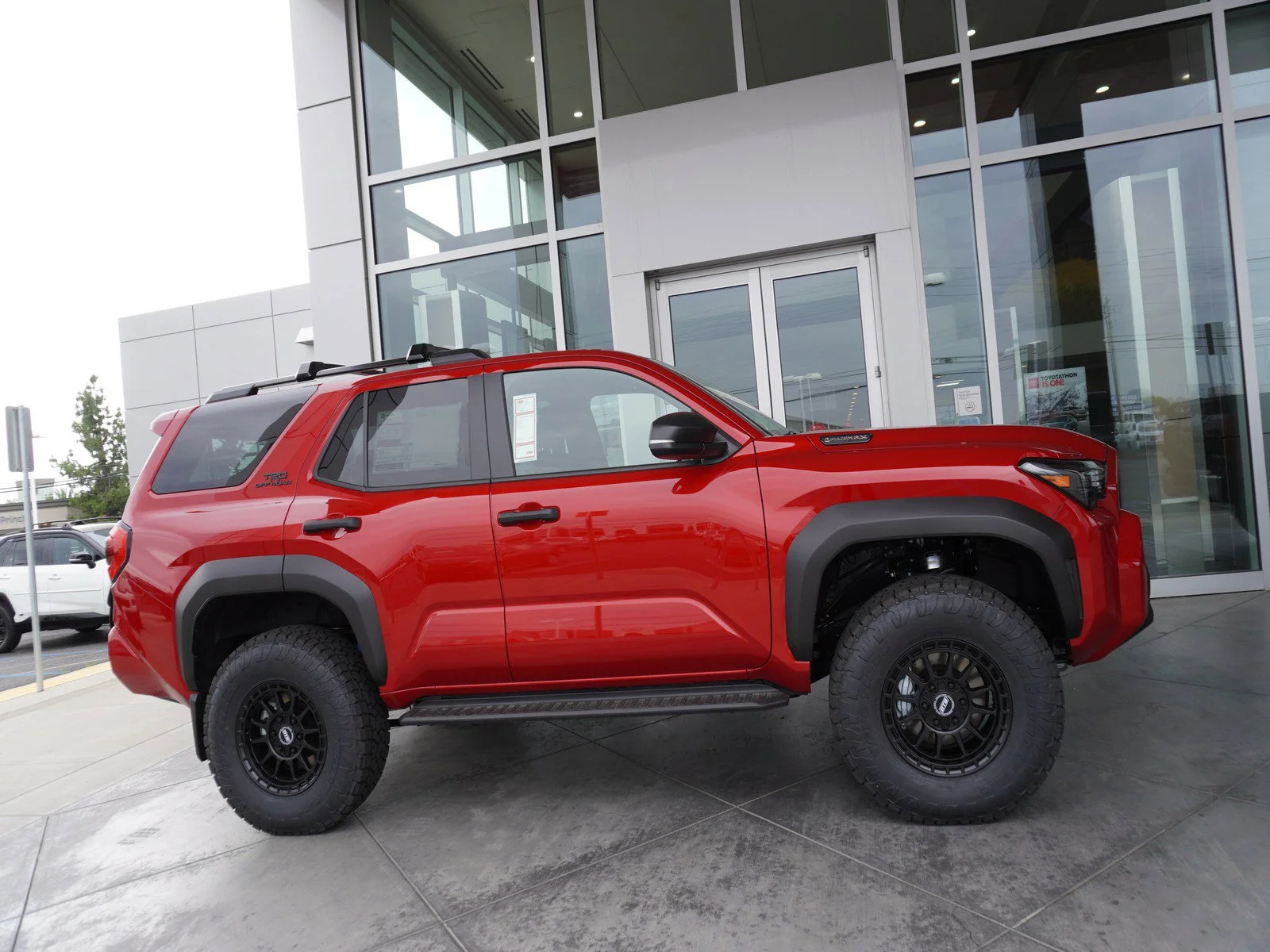 New 2026 Supersonic Red Toyota Hybrid TRD Off Road image 4