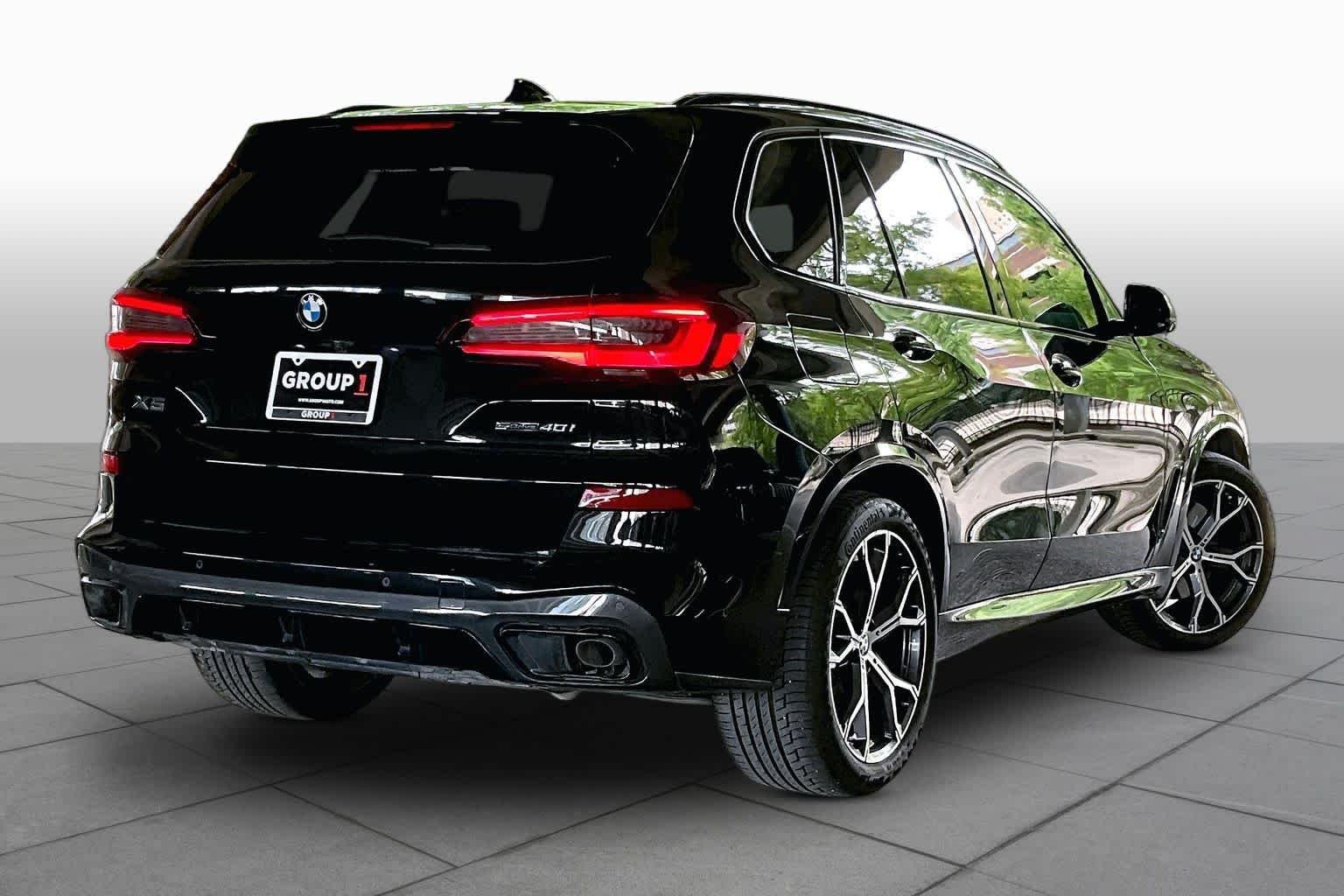 Used 2021 Black Sapphire Metallic BMW sDrive40i image 12