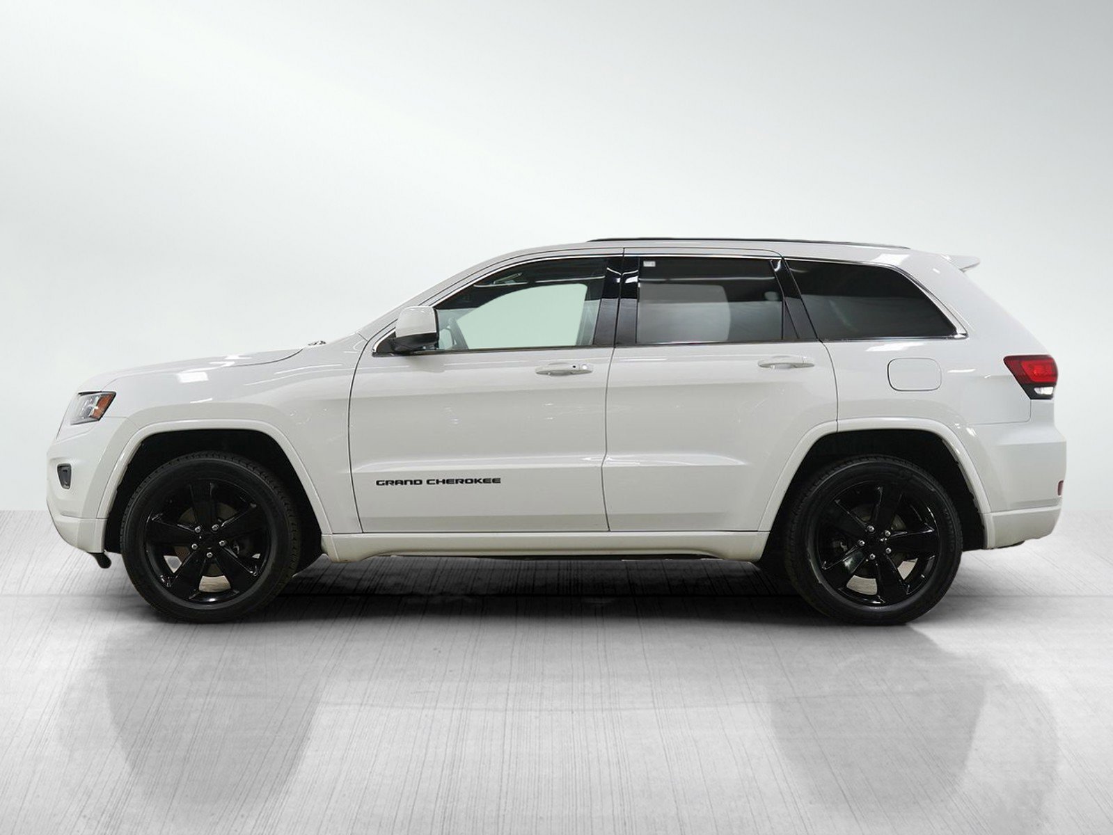 Used 2015 Jeep Grand Cherokee Altitude with VIN 1C4RJFAG6FC229809 for sale in Burnsville, Minnesota