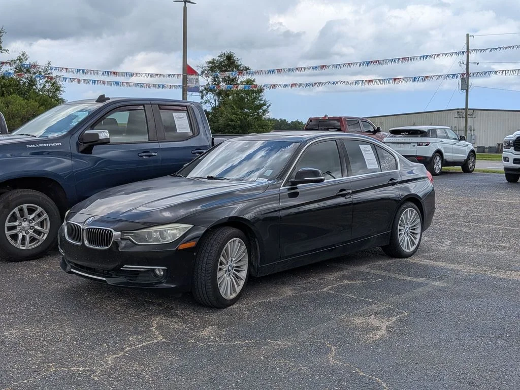 Used 2015 Black BMW 328i image 1