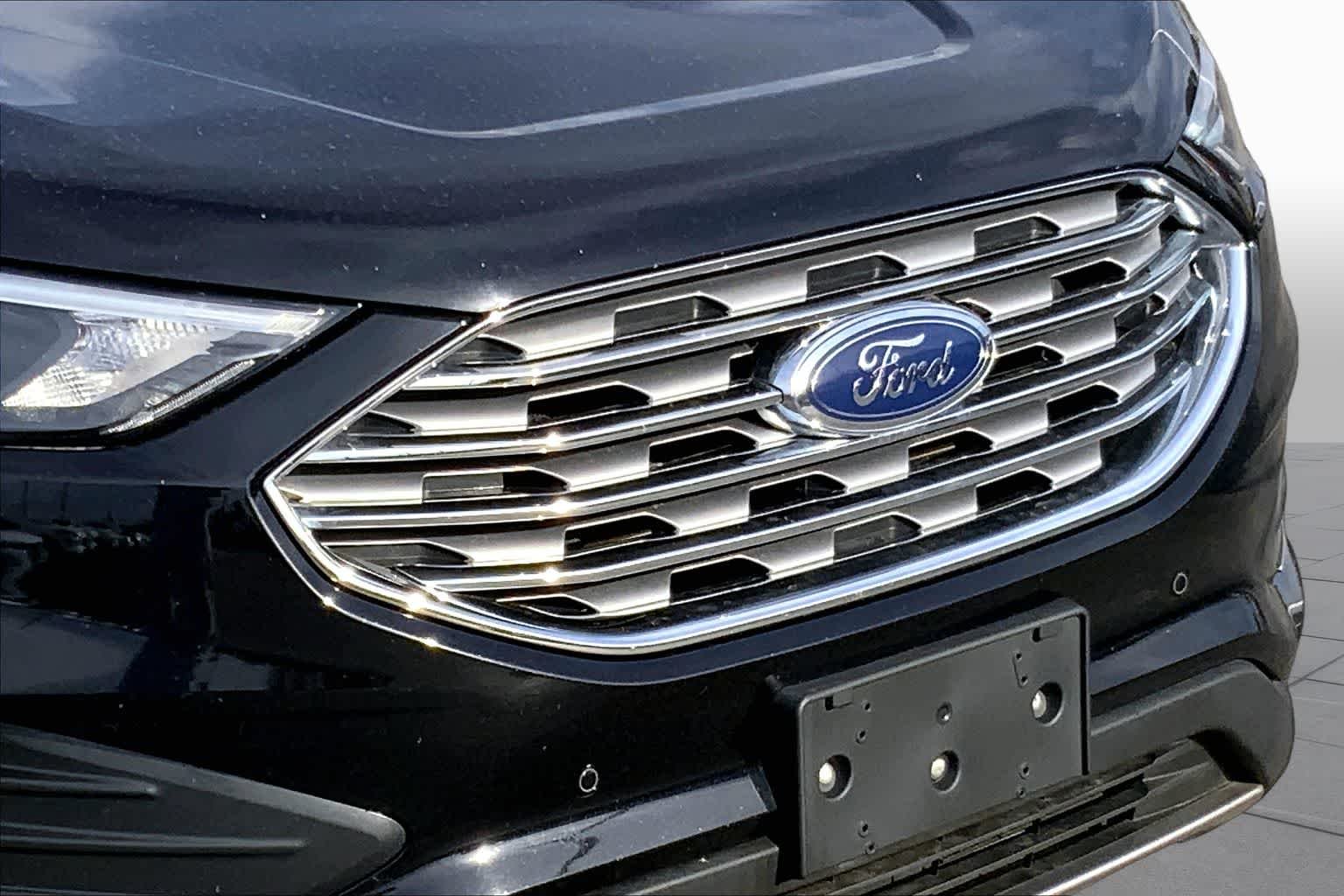 Used 2022 Agate Black Metallic Ford Titanium image 26