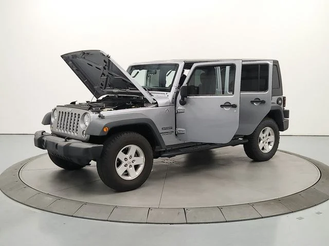 Used 2015 Silver Jeep Unlimited Sport image 12