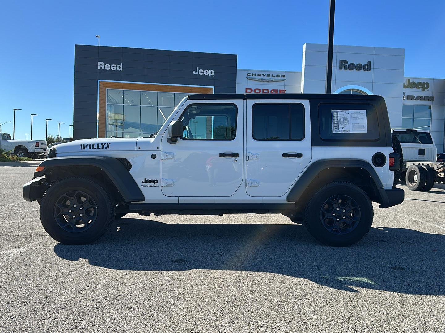 Used 2023 Jeep Wrangler 4-Door Willys with VIN 1C4HJXDN0PW695537 for sale in Kansas City