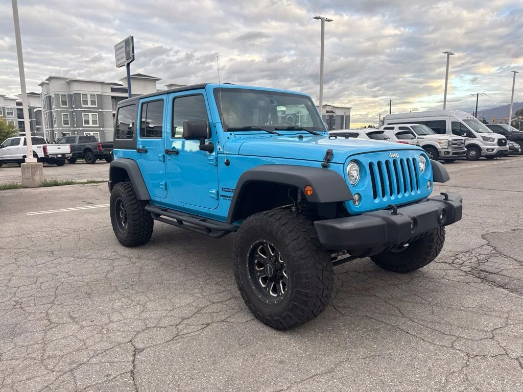 Certified Used 2017 Chief Clearcoat Jeep Unlimited Sport image 1