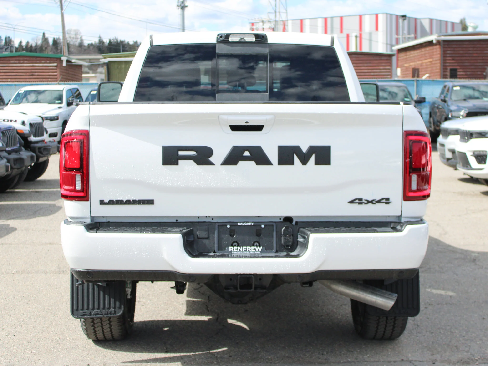 New 2026 White RAM Laramie* image 4
