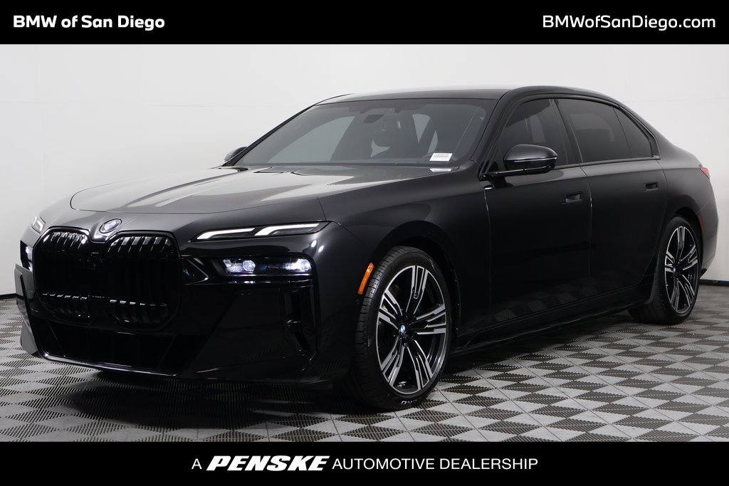 Certified Used 2023 Black Sapphire Metallic BMW xDrive60 image 1