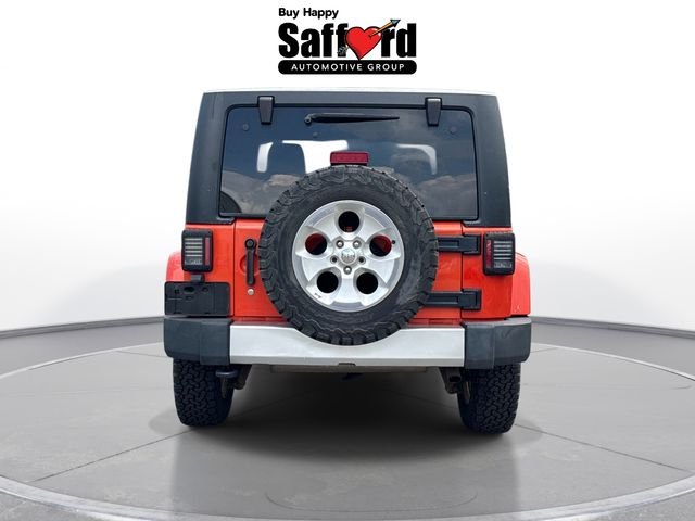 Used 2015 Orange Jeep Sahara image 6