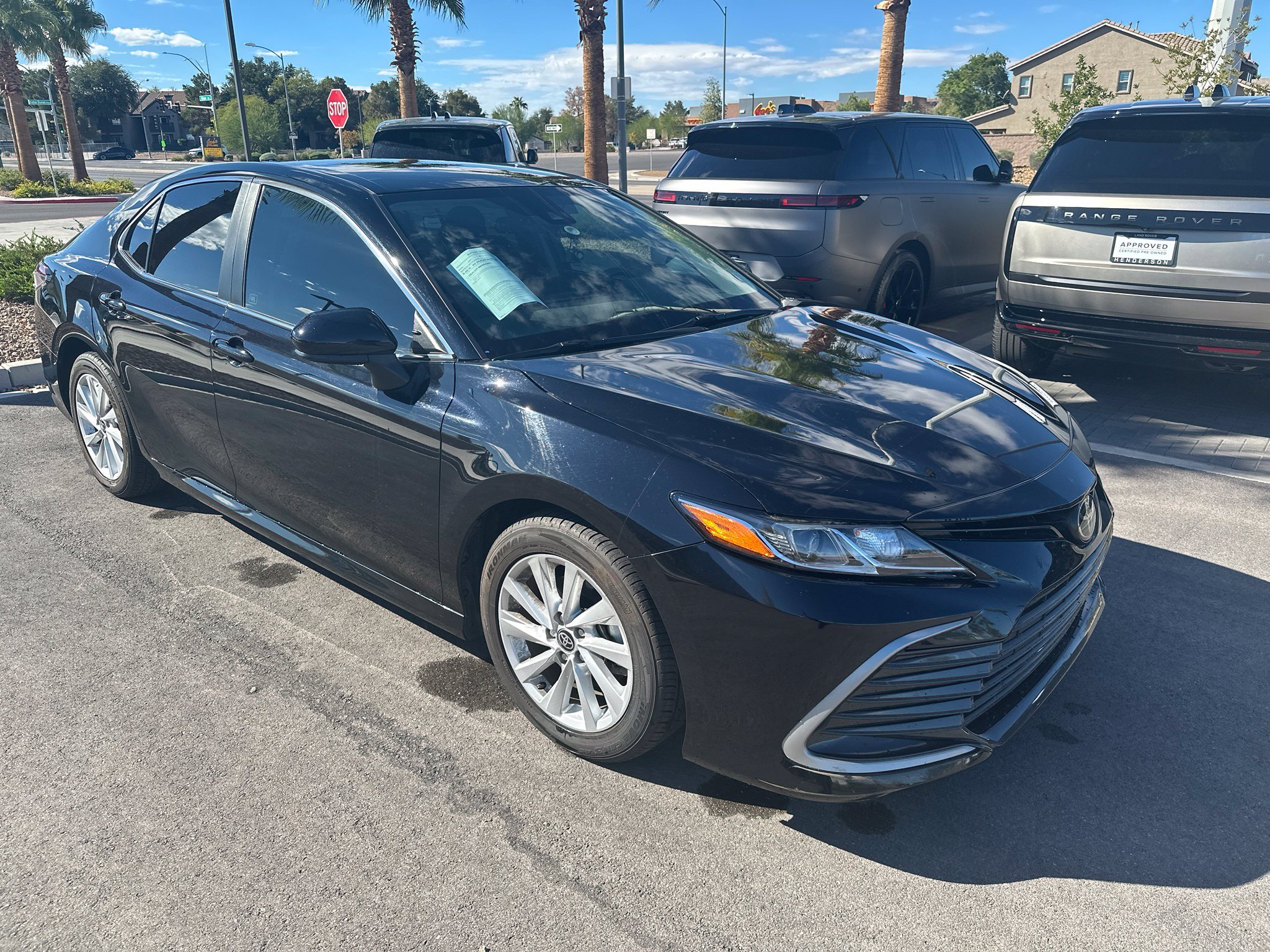 Used 2022 Midnight Black Metallic Toyota LE image 2