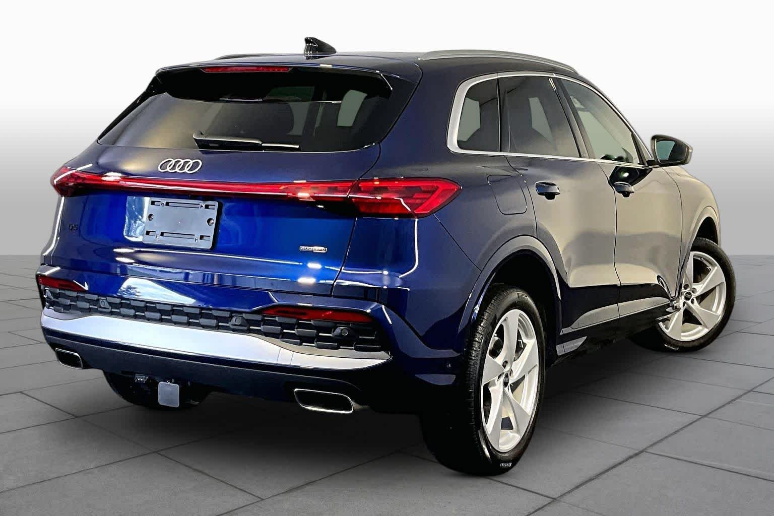 Used 2025 Navarra Blue Metallic Audi Premium Plus image 12