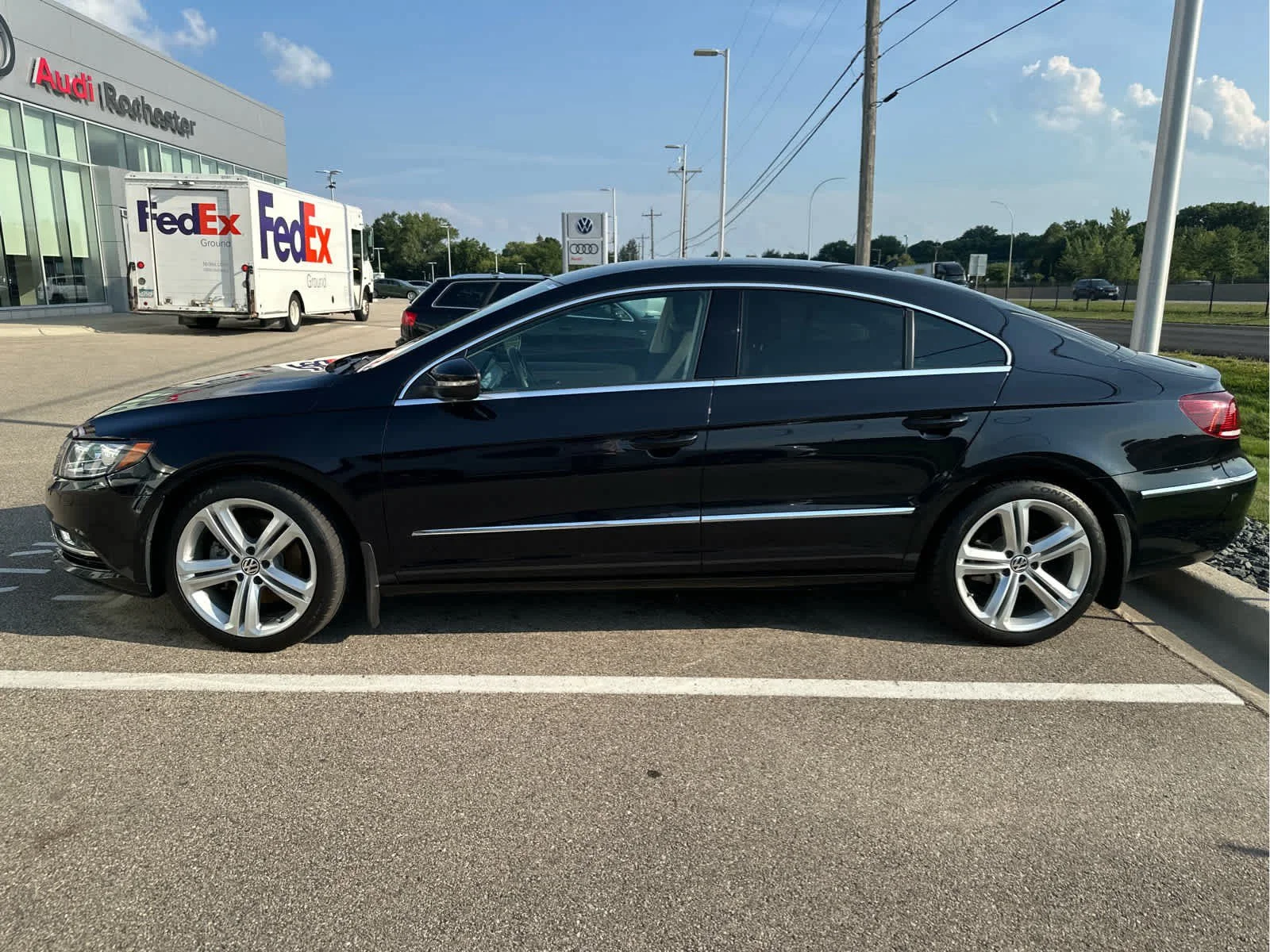 Used 2013 Deep Black Metallic Volkswagen Sport Plus image 4