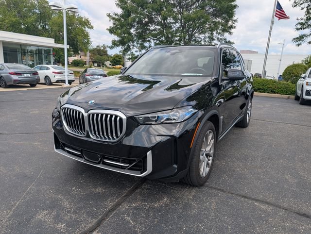 Certified Used 2024 Black Sapphire Metallic BMW xDrive40i image 10