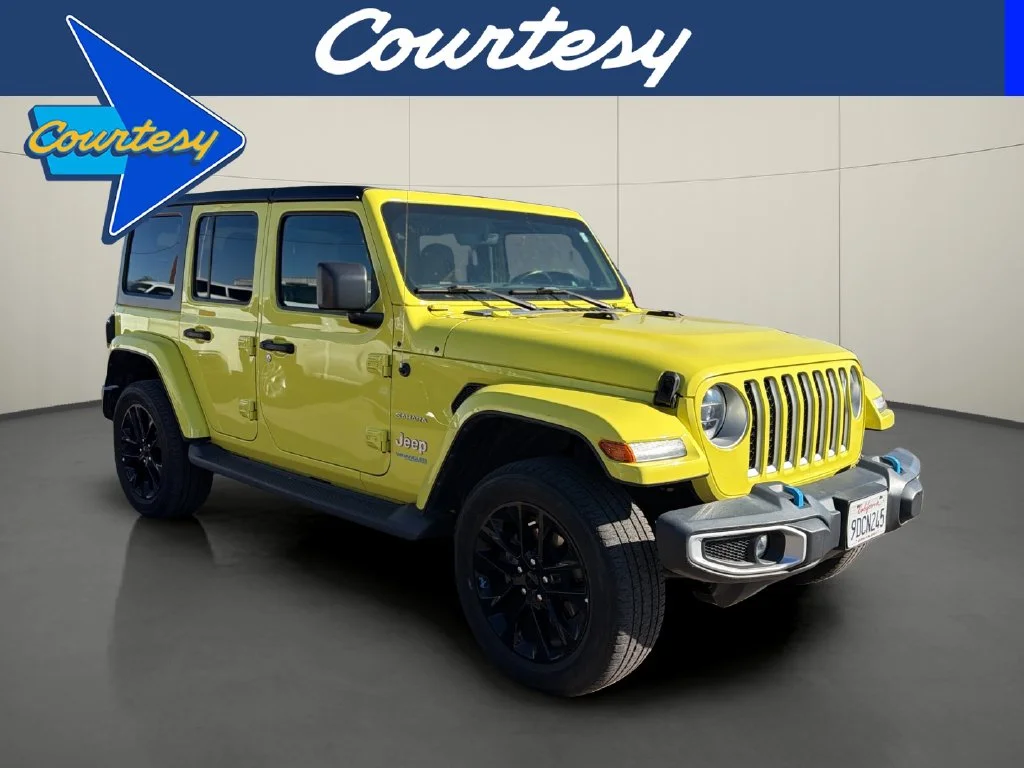 Used 2022 Yellow Jeep Unlimited Sahara 4xe image 1