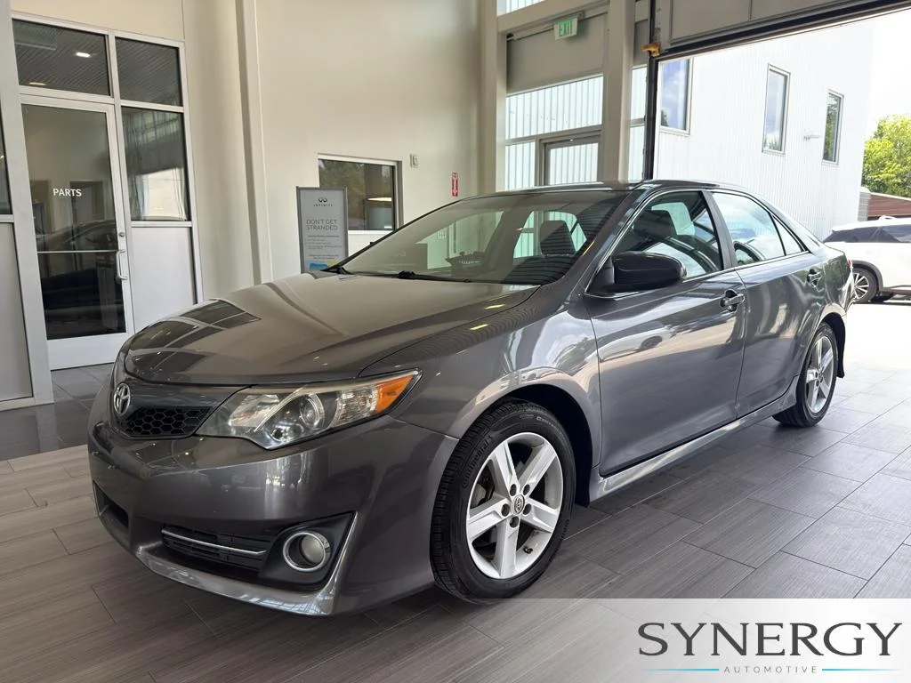 Used 2014 Magnetic Gray Metallic Toyota SE image 1