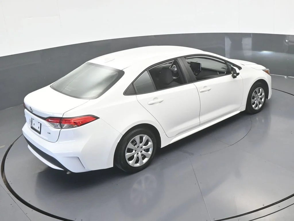 Used 2021 Super White Toyota LE image 40