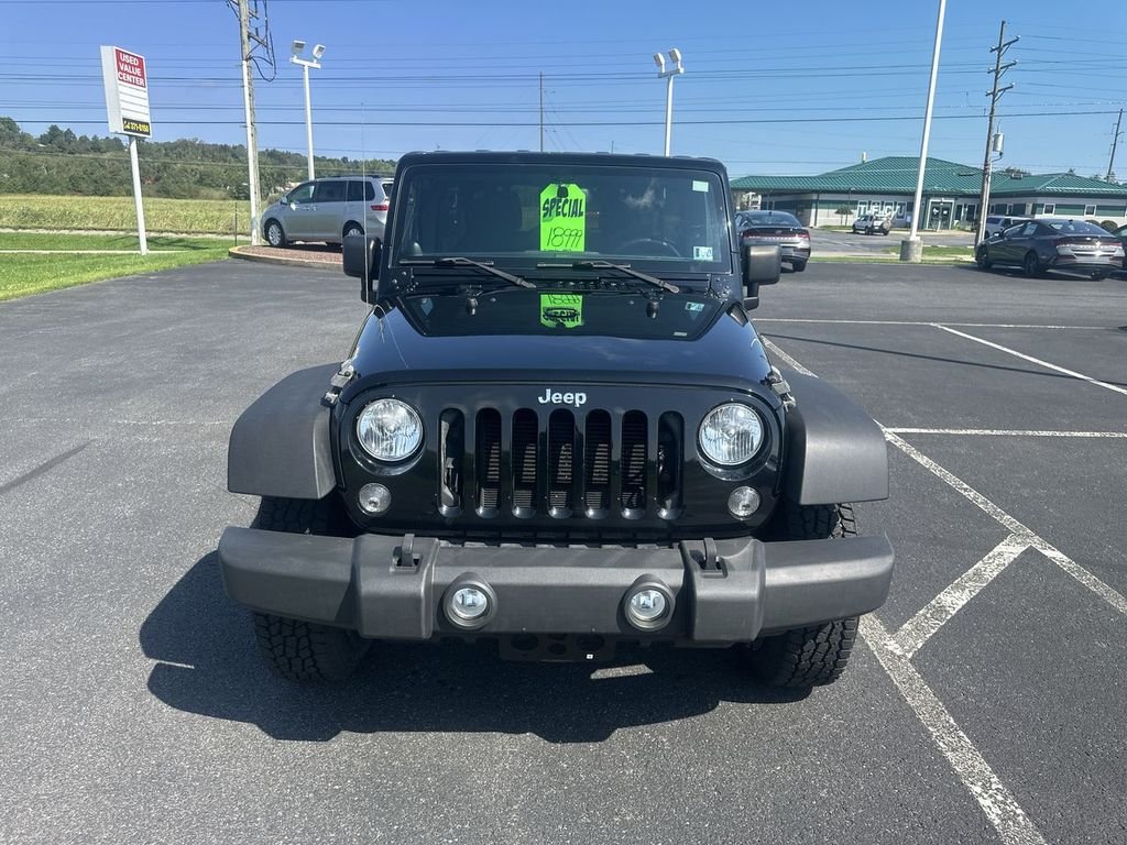 Used 2014 Black Jeep Unlimited Sport image 3