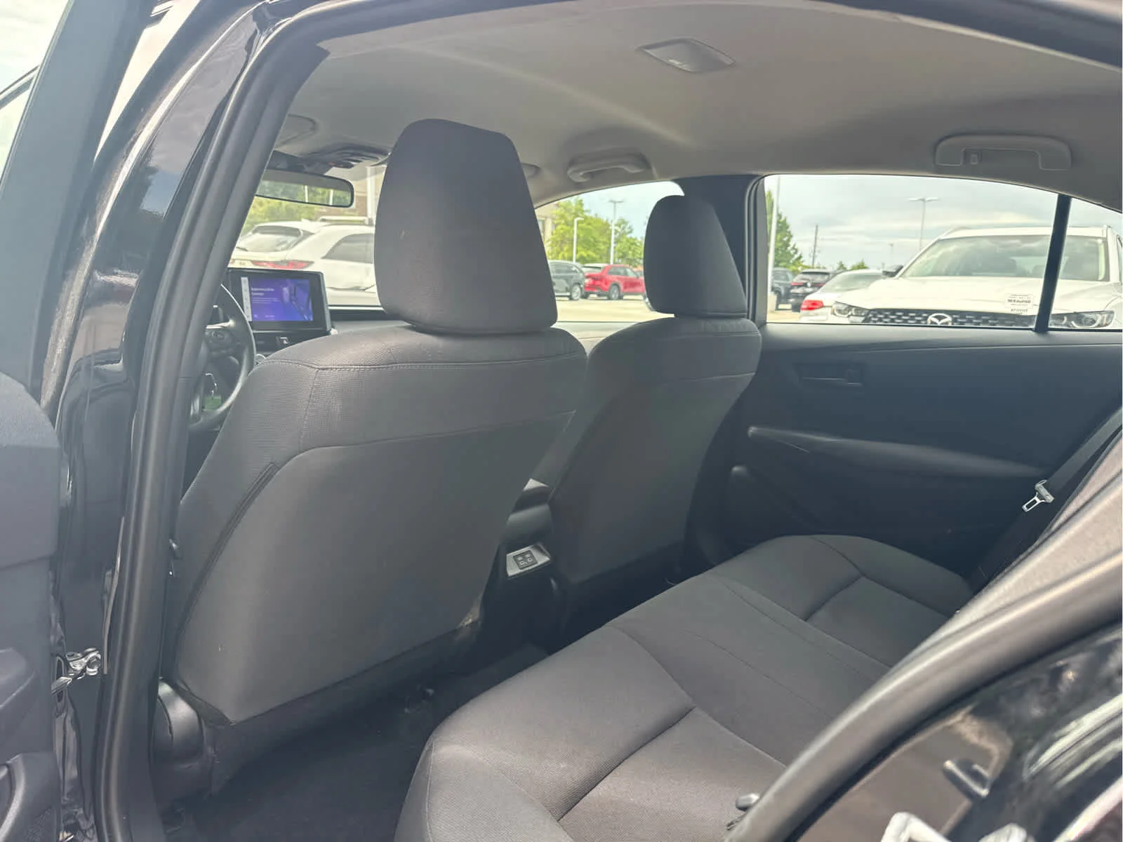 Used 2025 Midnight Black Metallic Toyota LE image 5