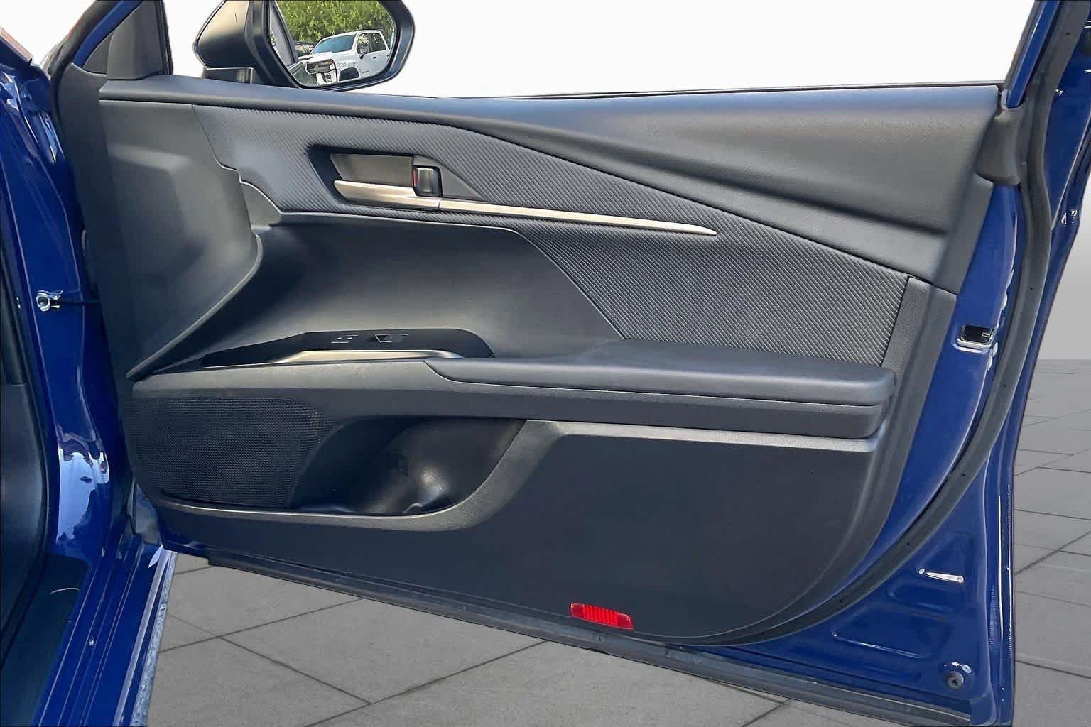 Used 2025 Reservoir Blue Toyota SE image 22