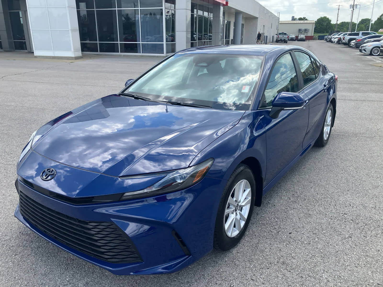 Used 2025 Reservoir Blue Toyota LE image 3