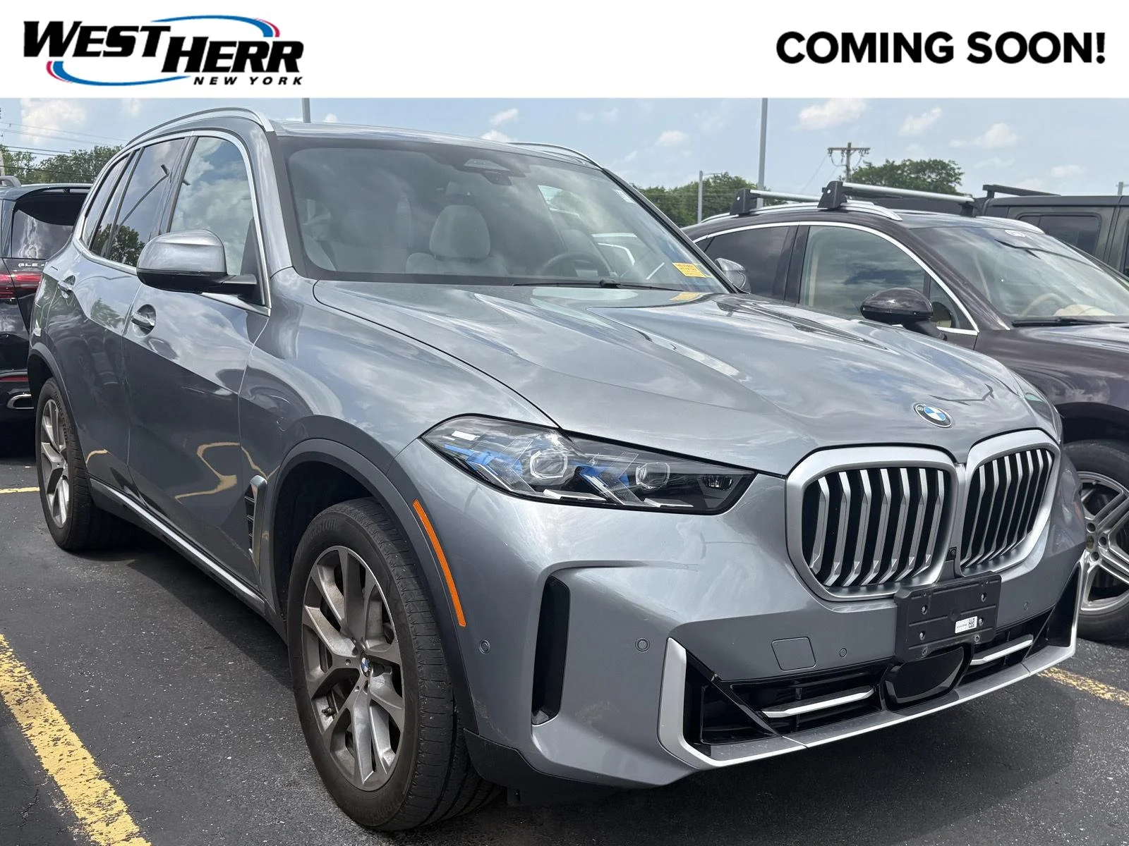 Used 2024 Skyscraper Grey Metallic BMW xDrive40i image 1