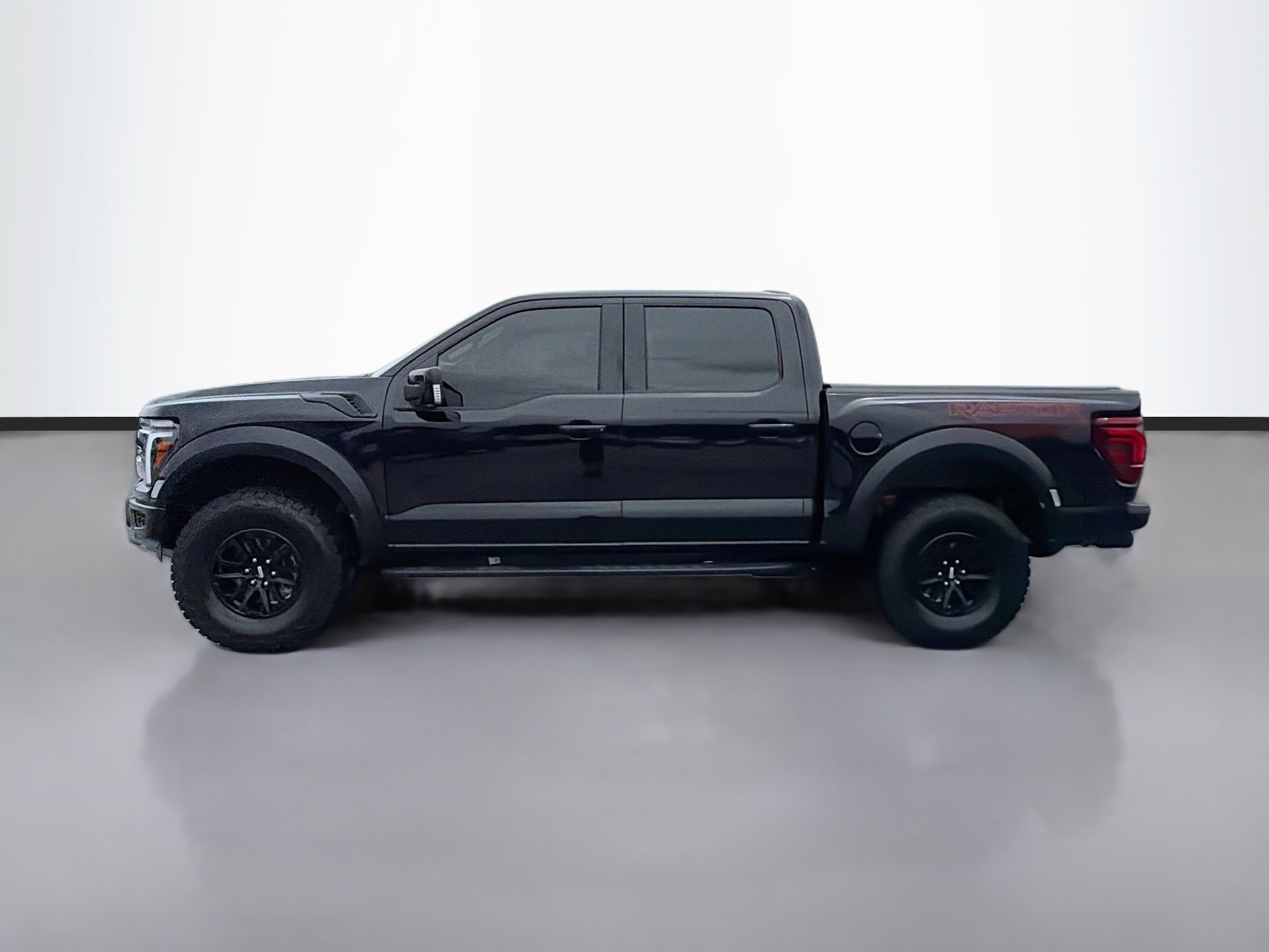 Used 2025 Black Metallic Ford Raptor image 2
