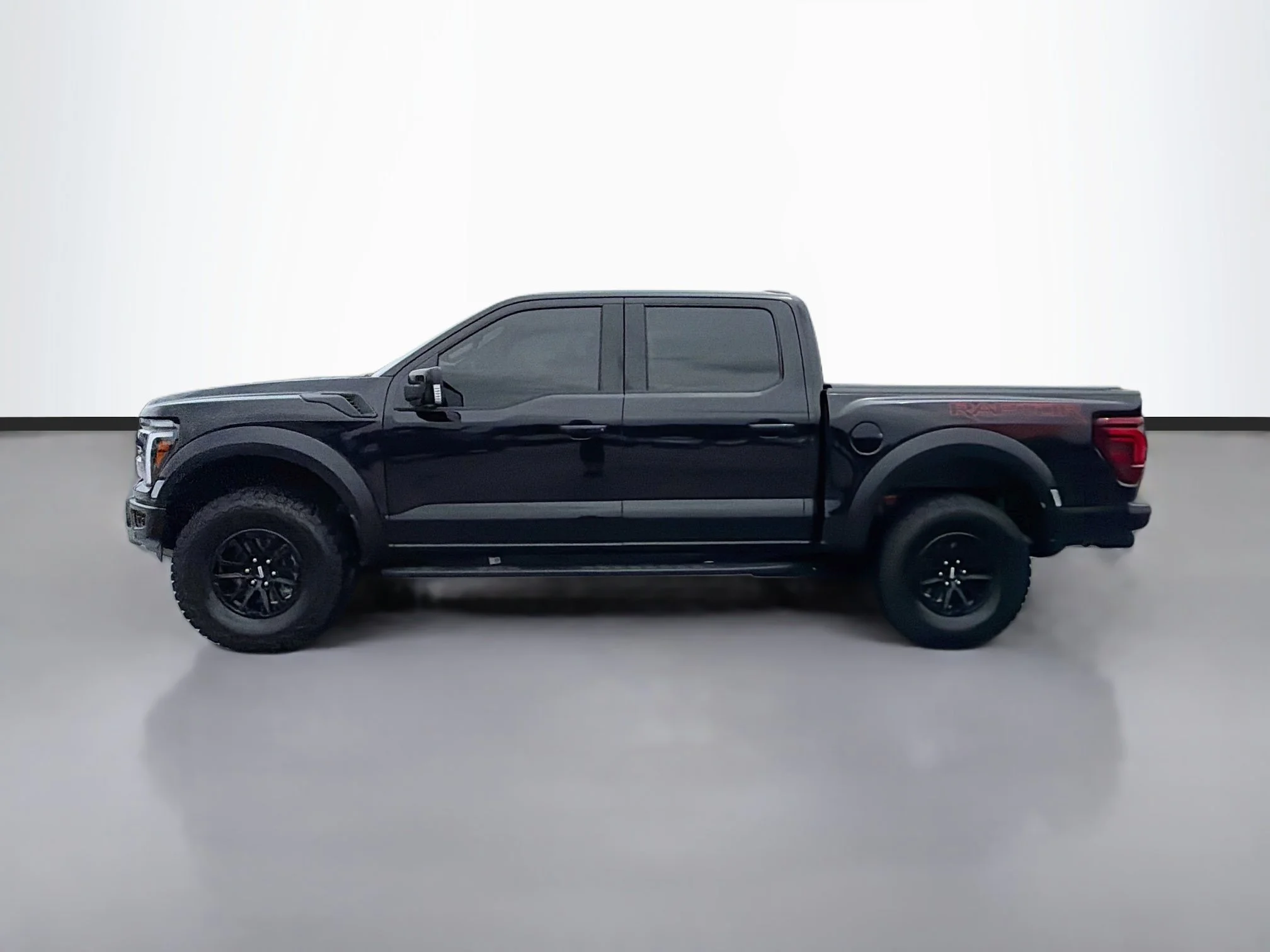Used 2025 Black Metallic Ford Raptor image 2