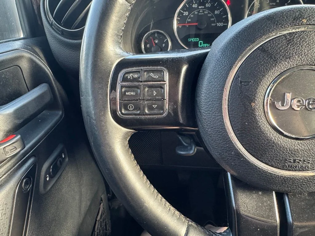 Used 2017 Black Jeep Unlimited Sahara image 15