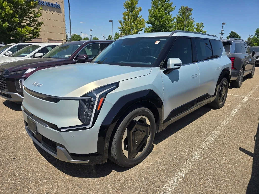 Used 2024 Ivory Silver Matte Kia Land image 1