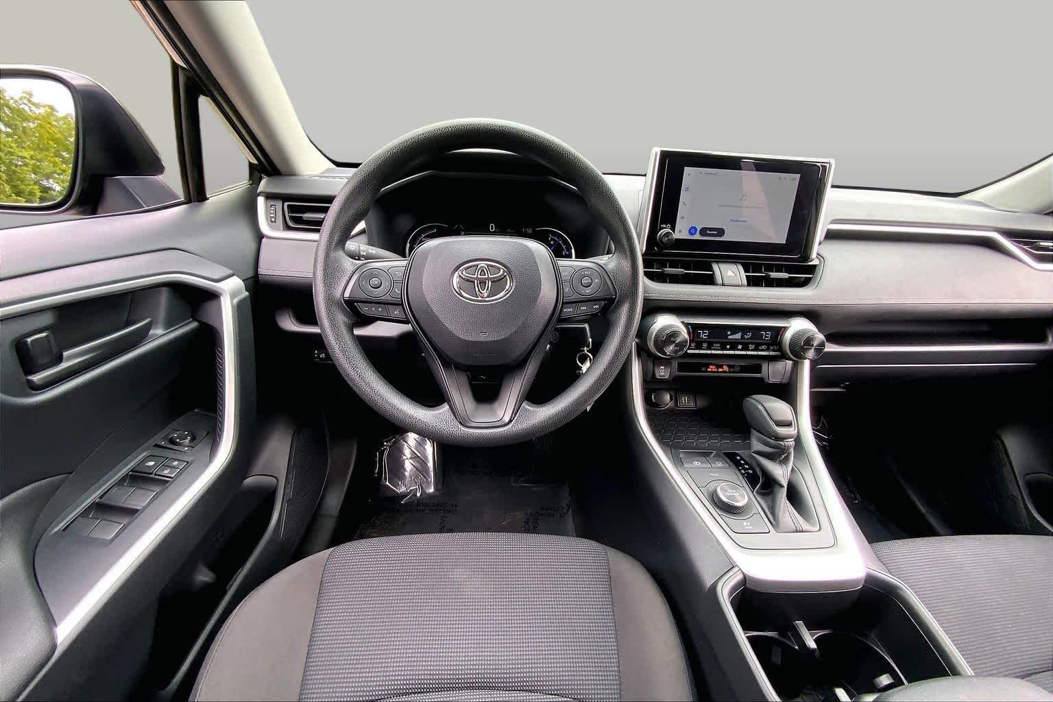 Used 2025 Magnetic Gray Metallic Toyota Hybrid LE image 6