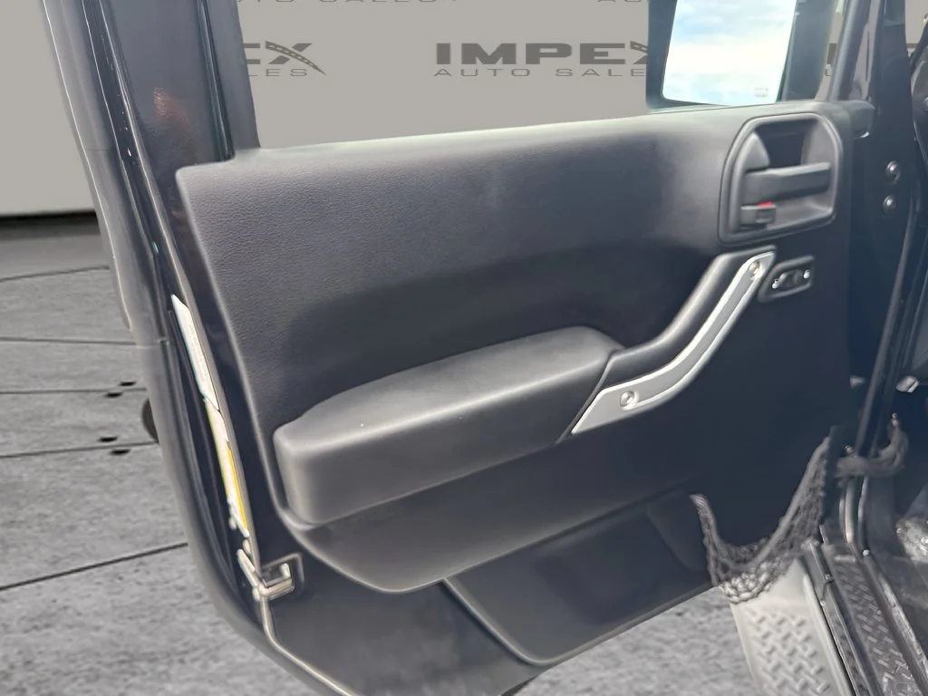 Used 2011 Black Jeep Sahara image 21
