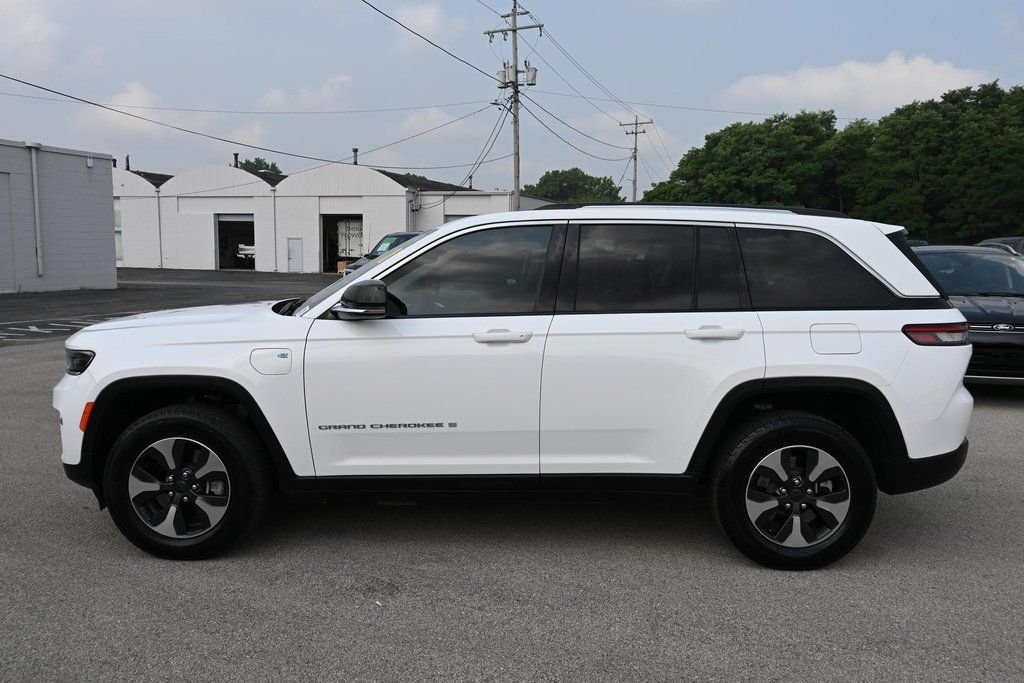 Used 2023 Bright White Clearcoat Jeep 4xe image 4