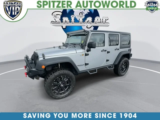 Used 2015 Silver Jeep Unlimited Sport image 4