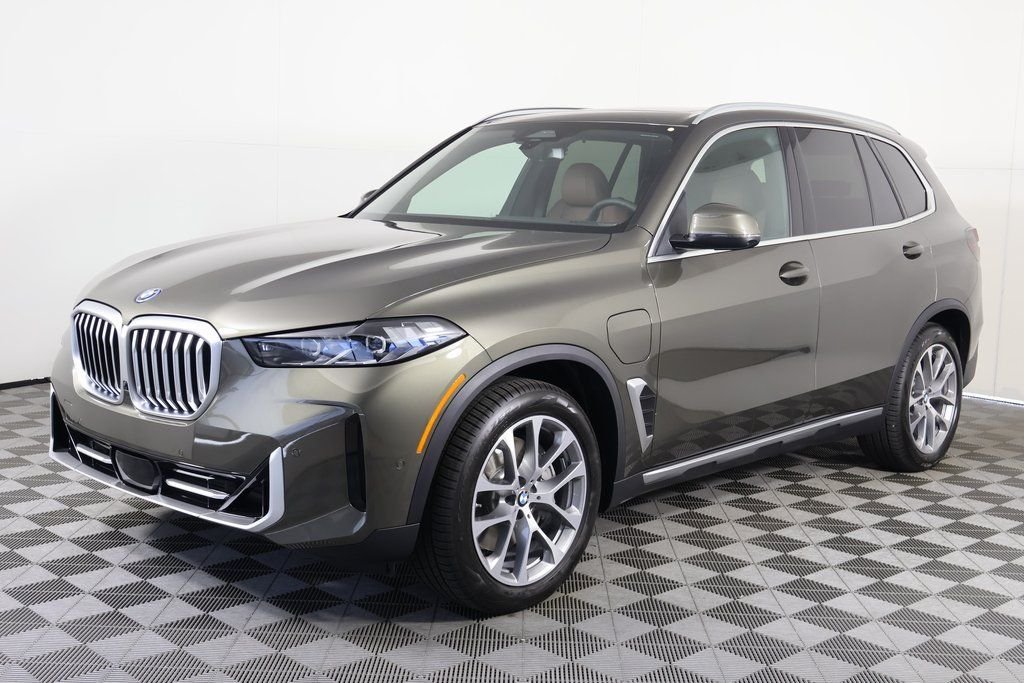New 2026 Green Metallic BMW xDrive50e image 1