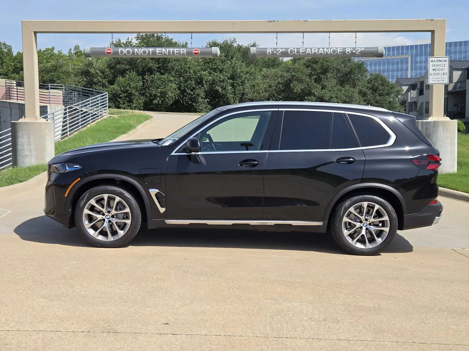 New 2026 Black Sapphire Metallic BMW xDrive50e image 2
