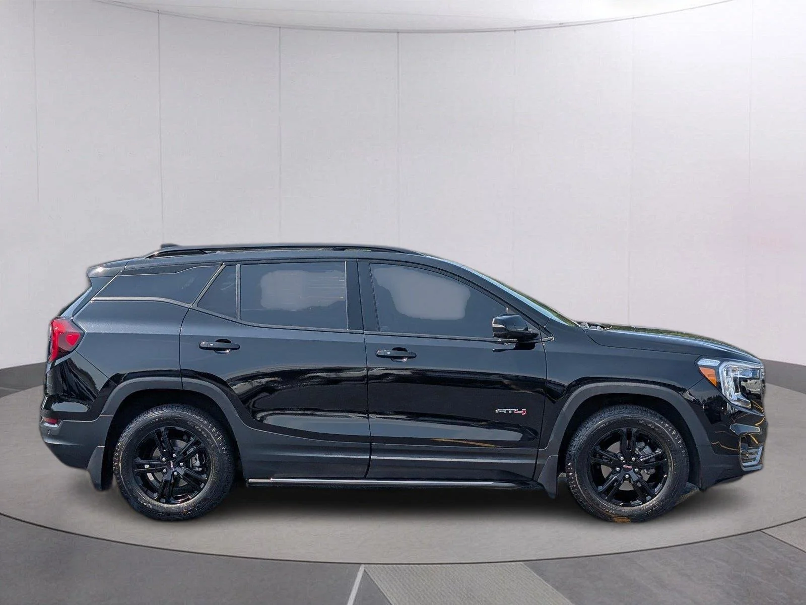 Used 2023 EBONY TWILIGHT METALLIC GMC AT4 image 6