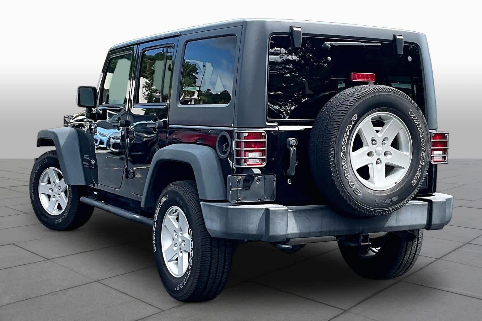 Used 2016 Black Clearcoat Jeep Sport image 11