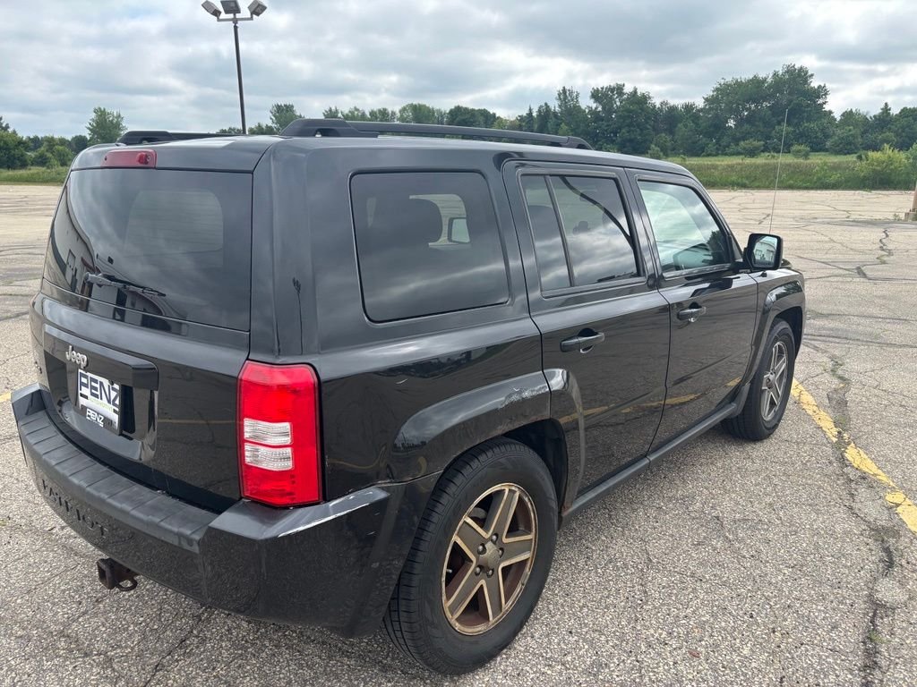 Used 2010 Black Jeep Sport image 7