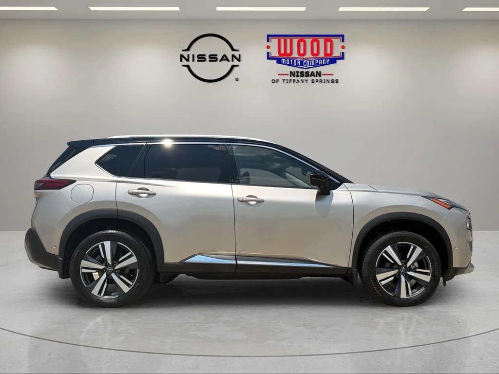 Used 2023 Champagne Silver Metallic Super Black Nissan Platinum image 2