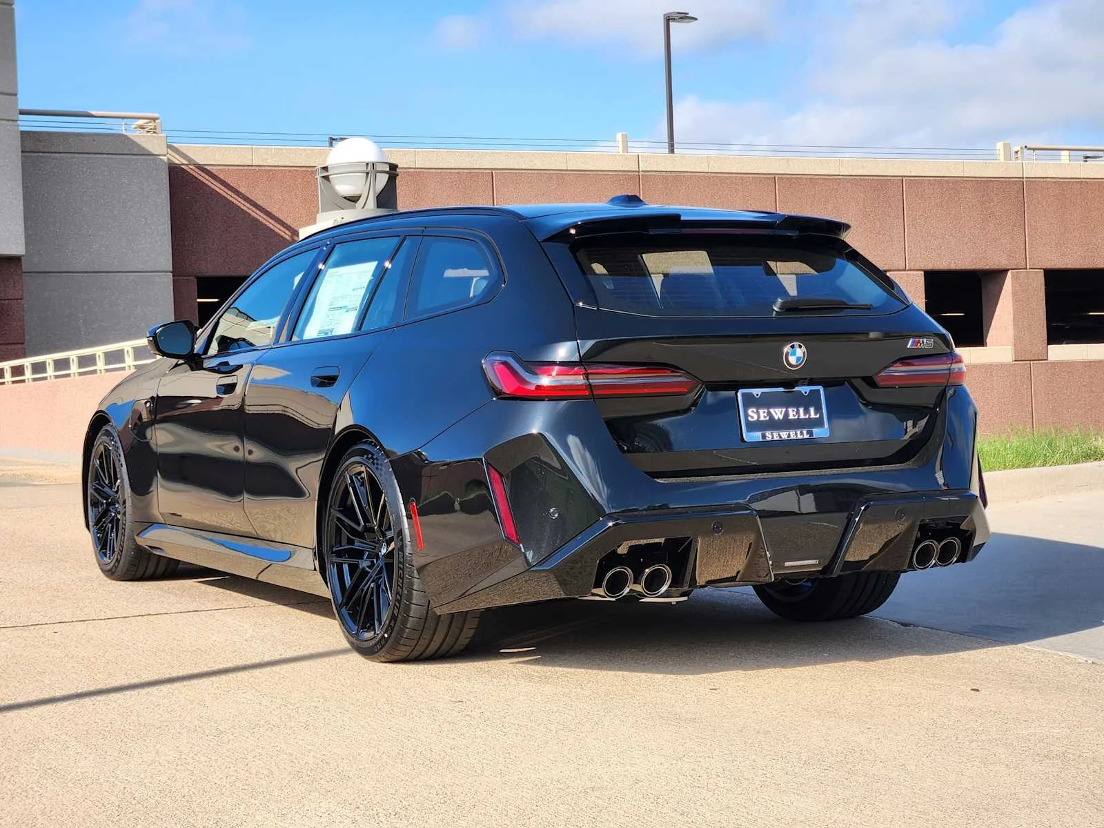 New 2027 Black Sapphire Metallic BMW  image 3