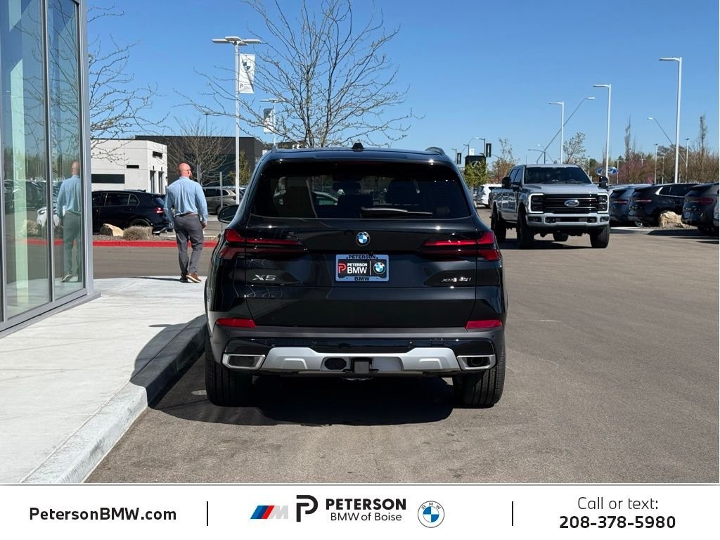 New 2026 Black Sapphire Metallic BMW xDrive40i image 4